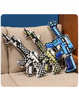 Detail of pixel art style plush rifle pillows in three colors on a cozy sofa
