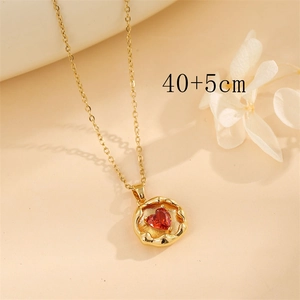 Vintage heart necklace in gold steel with red zircon pendant on a delicate chain