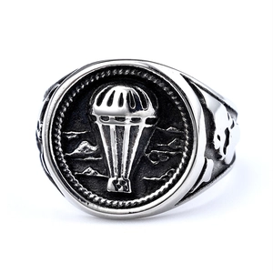Vintage stainless steel parachute ring with embossed silver military details