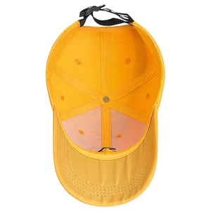 Inside view of bright yellow cotton baseball cap showing mesh lining and black strap