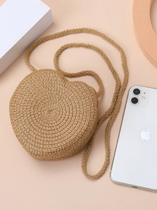 Handmade heart-shaped straw bag for girls with woven strap for beach vacation