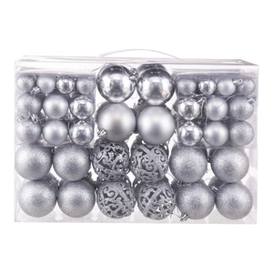 Silver Christmas ball ornaments set with matte, glitter, and hollow carved textures