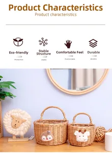 Detail view of woven wicker baskets featuring cute penguin and cow fabric appliques