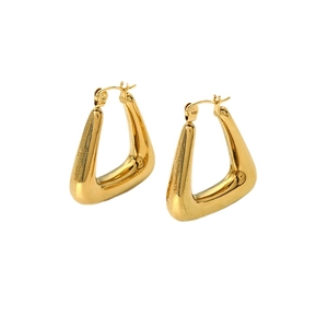 Minimalist gold triangular stainless steel geometric hoop earrings on white background
