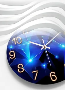 Macro shot of 3D gold numbers and geometric blue patterns on the wall clock