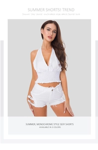 Detail of high waisted white denim shorts featuring stylish side buckle straps for women