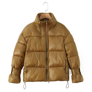 Winter puffer jacket with stand collar and double zipper in ochre yellow nylon
