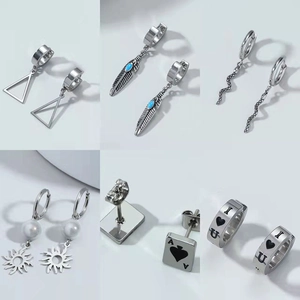 Collection of six minimalist silver titanium steel earrings with feather and snake charms