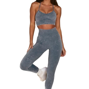 Two-piece acid wash yoga set featuring a V-neck sports bra and high waist leggings