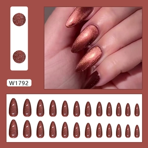 Dark red cat eye press-on nails with fine glitter in 24-piece almond shape set