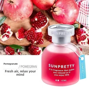 Detail of 65ml Sunpretty pomegranate fragrance liquid in pink frosted glass bottle