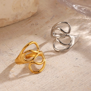 Abstract hollow line rings in gold and silver finish with minimalist geometric design