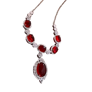 Vintage necklace featuring oval ruby zircon pendant on a silver-plated luxury chain