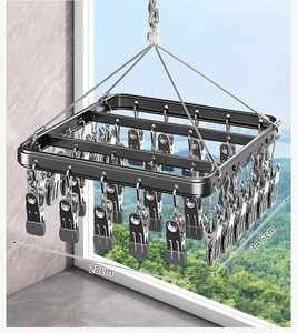 Close-up of square aluminum drying rack with 30 clips, measuring 34.5cm by 28cm size