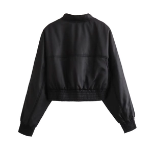 Flat lay back view of black nylon bomber jacket featuring ribbed cuffs and hemline
