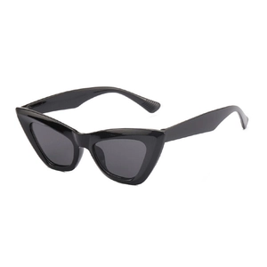 Retro cat-eye sunglasses with glossy black frame and dark grey lenses in 45-degree view