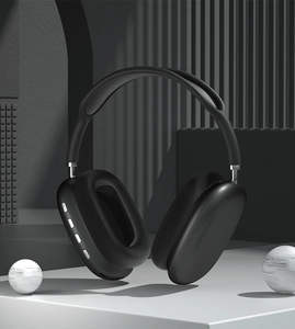 Close-up of black P9 Air Max wireless headphones featuring ANC and Bluetooth buttons