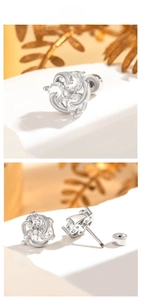 Macro detail of star-moon zircon stud earrings featuring a flower-like silver design