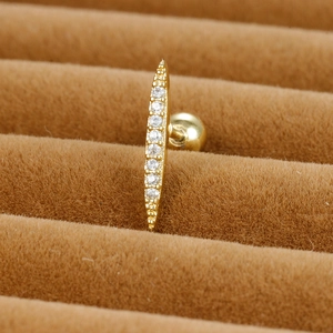 Golden stainless steel cartilage stud with cubic zirconia in brown velvet box