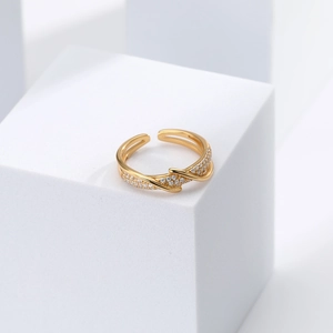 Elegant gold-plated S925 silver cross ring with pavé zircons on a white minimalist block