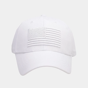 Close-up of white USA flag embroidery on a cotton twill baseball cap with stitching detail