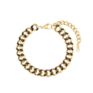 Gold Cuban chain bracelet with black oil drip details and adjustable lobster clasp