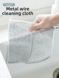 Detail of silver wire dishcloth for dual dry and wet use cleaning on kitchen sink