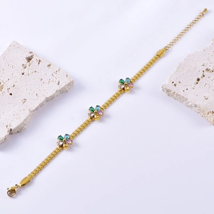Gold chain bracelet with colorful zircon flowers and adjustable lobster clasp closure