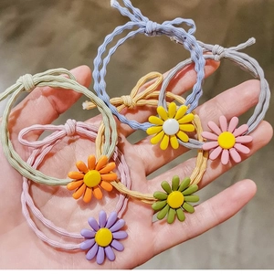 Colorful daisy flower hair ties with double elastic ropes in various vibrant pastel shades