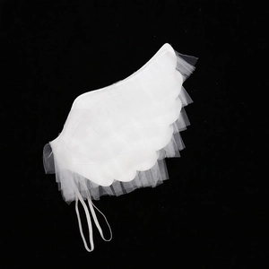 Detail of white layered mesh angel wings with elastic straps for Halloween costume