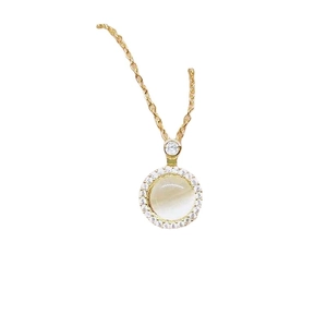 Rotating cat's eye stone pendant necklace with shimmering cubic zirconia in gold finish