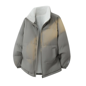 Close-up of dark grey winter jacket featuring white fleece lining and stand collar detail