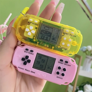 Mini retro Tetris game console keychain in transparent yellow and soft pink finishes