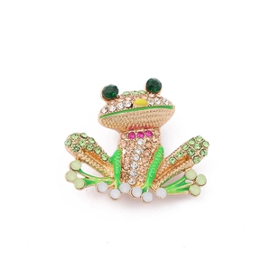 Exquisite frog brooch in gold metal with green enamel and sparkling crystals