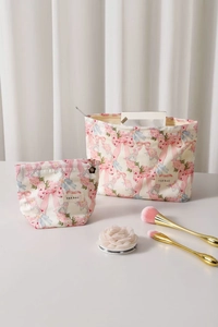Detailed set of floral cotton makeup bags with pink bow print and branded H&R BAG labels