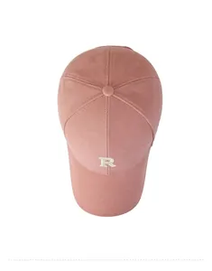 Top view of pink cotton baseball cap with white embroidered R letter and curved brim