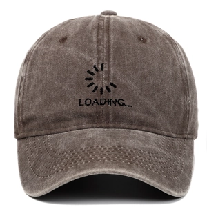 Detail of embroidered Loading text and icon on vintage washed cotton baseball cap