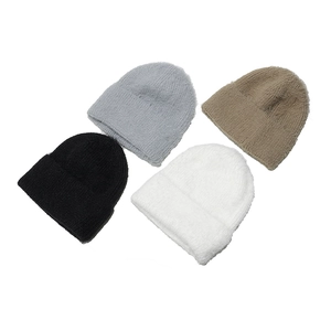 Winter plush knitted beanie hats in black, grey, white and khaki for warmth