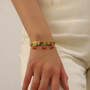 Gold-plated Italian style modular stretch bracelet with red enamel cherry pendants and zircons