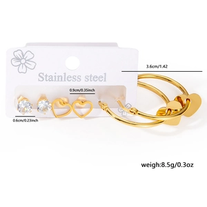 Detailed view of 3-pair stainless steel earring set with heart motifs and zirconia studs