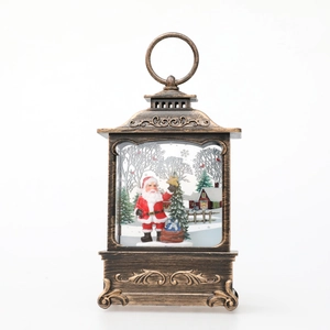 Vintage bronze Christmas lantern with Santa Claus and sparkling snow scene decoration