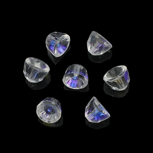 Macro shot of 8mm faceted glass bell pendants with iridescent blue-violet reflections