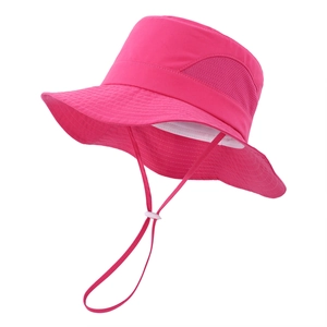 Detail view of breathable side mesh and adjustable chin strap on rose red sun hat
