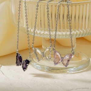 Dreamy butterfly crystal pendant necklaces in purple, pink, and clear zircon stones
