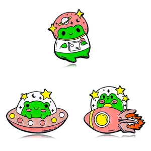 Cute cartoon astronaut frog metal badges in spaceship, UFO, and rocket designs