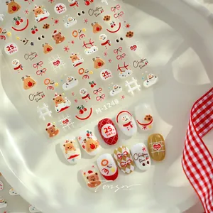 Detail of Christmas nail art stickers M-1248 featuring bears, reindeer and snowmen