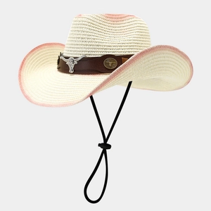 Beige woven straw cowboy hat with pink gradient brim and silver bull head ornament