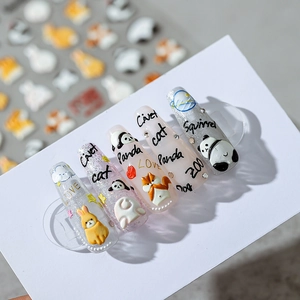 3D cartoon animal nail stickers with panda and squirrel designs on silver glitter nails