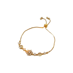 Adjustable gold snowflake bracelet with sparkling zircon charms for women