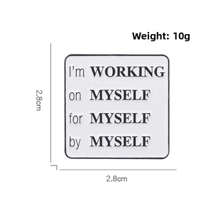 Square metal brooch featuring 'I'm WORKING on MYSELF' quote with 2.8cm size detail